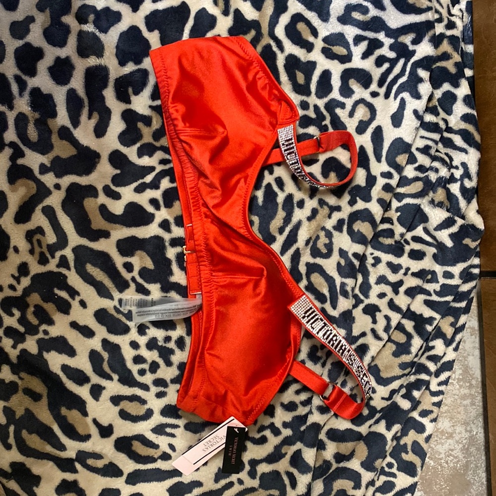 Victoria’s Secret red swim top, new with tags, never worn, size large